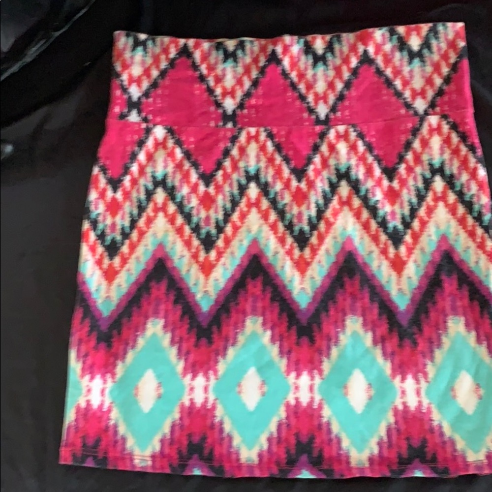 High waisted mini skirts. 2 avail. pink print or orange print.